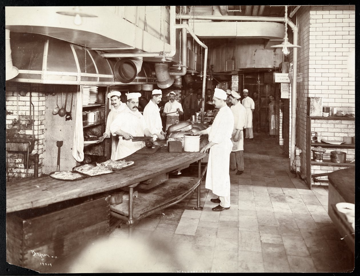 Cooks working in the kitchen of the Waldorf Astoria Hotel at 34th Street and 5th Avenue, New York, 1903 or 1904 by Byron Company